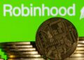 Acciones que realizan los movimientos más grandes del mediodía: TSLA, Hood, NVDA, CTSH