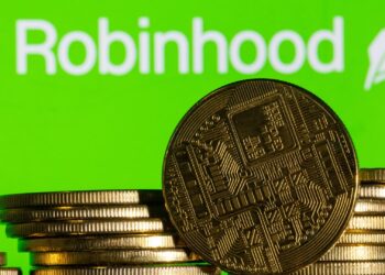 Acciones que realizan los movimientos más grandes del mediodía: TSLA, Hood, NVDA, CTSH