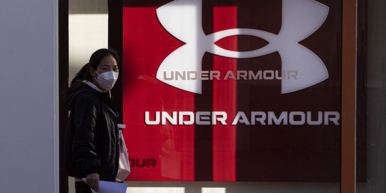 Acciones que realizan los movimientos más grandes Premarket: UAA, Expe, TTD, MP